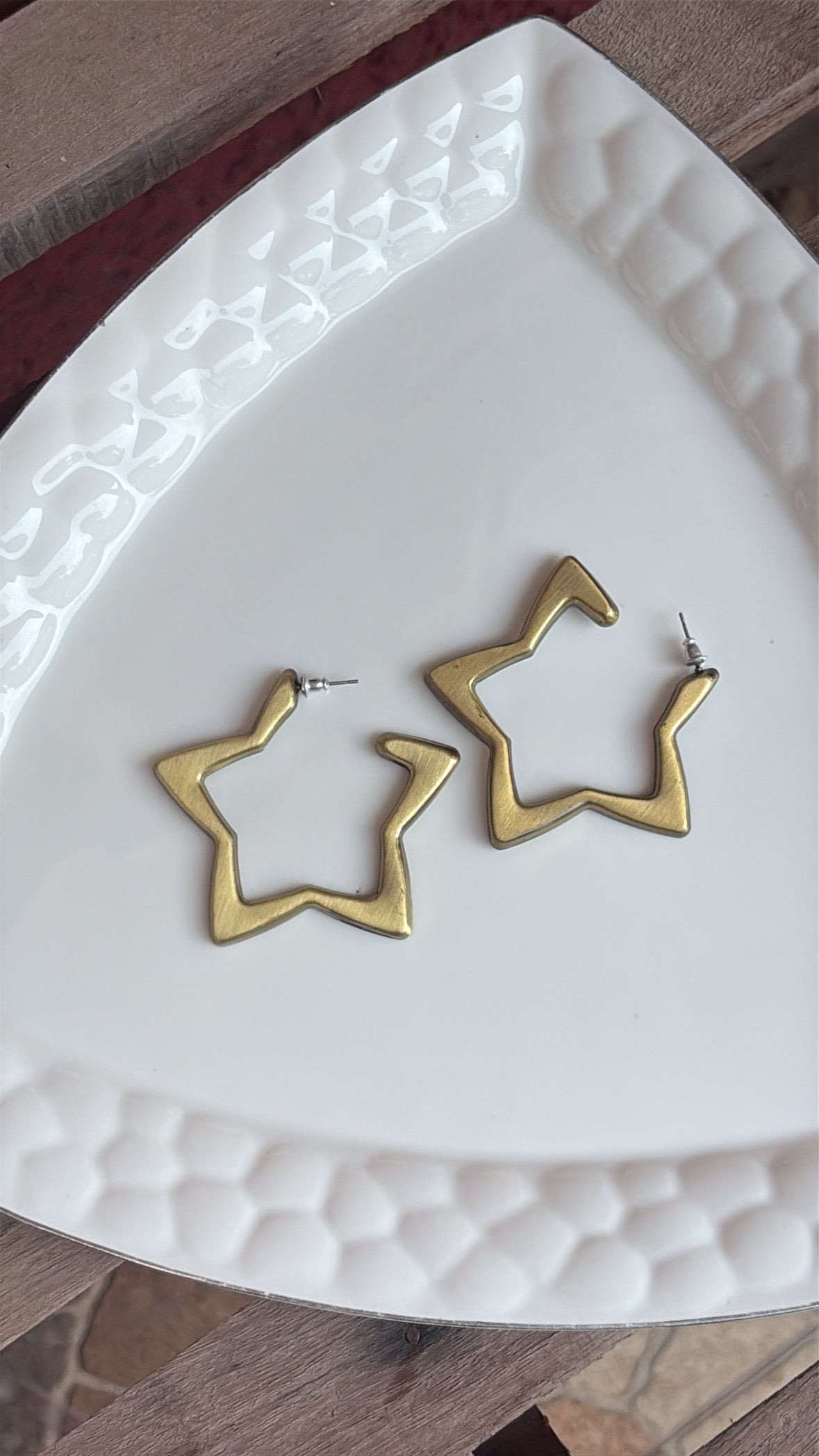 Gilded star earrings