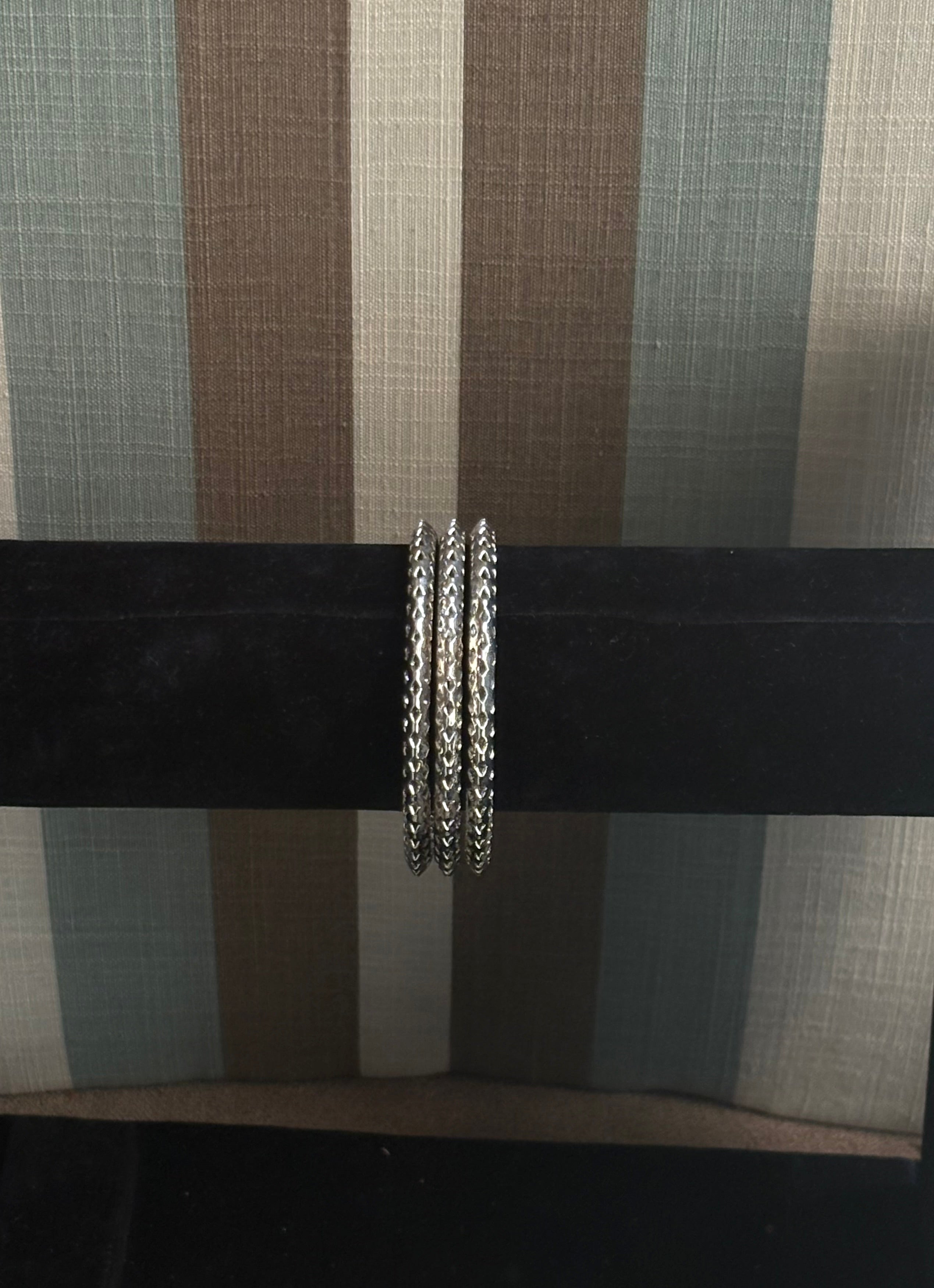 Everyday silver bangle trio