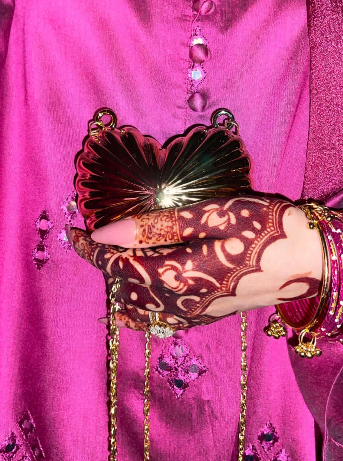 Golden metalic heart clutch