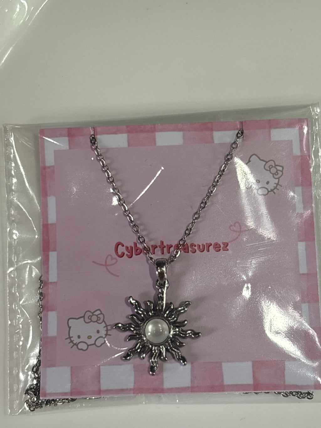 Stainless silver sun necklace