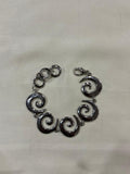 Silver swirl bracelet